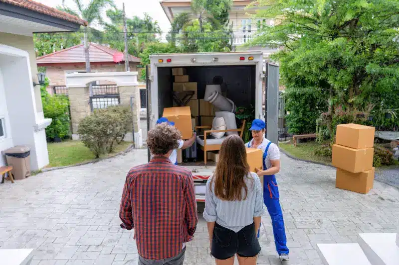 Professionals packing moving van